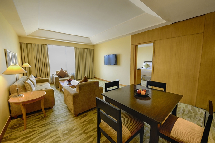 Imagen de la habitación del Hotel The Grand New Delhi. Foto 9