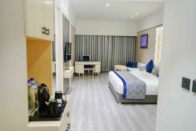 Imagen de la habitación del Hotel The Grand Nirvana and Resort. Foto 11