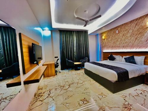Imagen de la habitación del Hotel The Grand Oasis & Resort. Foto 18