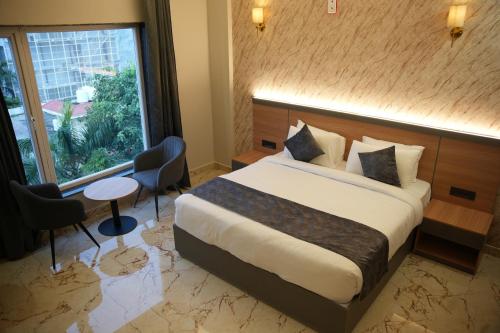 Imagen de la habitación del Hotel The Grand Oasis & Resort. Foto 19