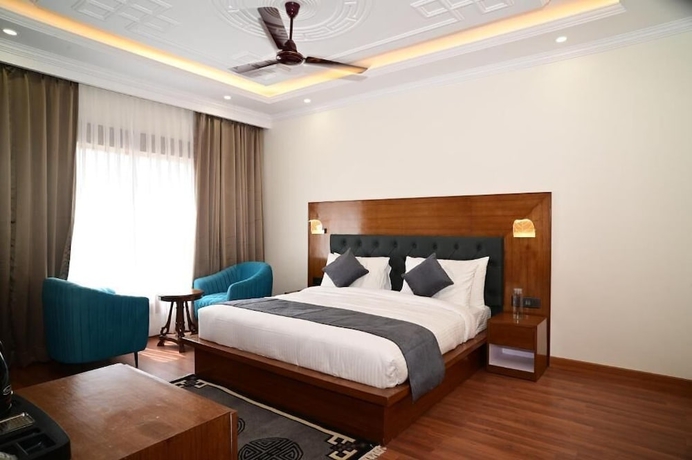 Imagen de la habitación del Hotel The Grand Orchard Resort. Foto 11