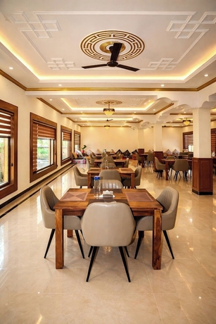 Imagen del bar/restaurante del Hotel The Grand Orchard Resort. Foto 8