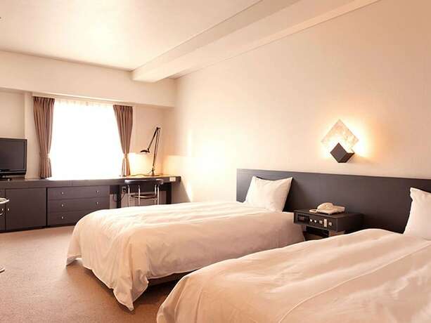 Imagen de la habitación del Hotel The Grand Palace, Tokushima. Foto 18