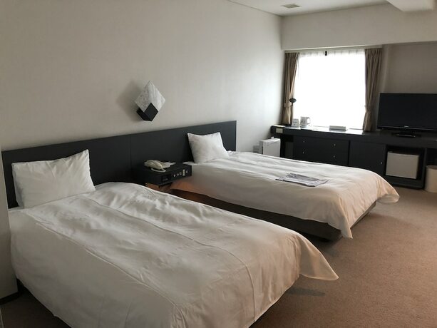 Imagen de la habitación del Hotel The Grand Palace, Tokushima. Foto 19