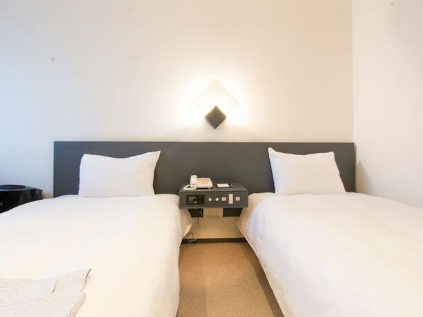 Imagen de la habitación del Hotel The Grand Palace, Tokushima. Foto 22
