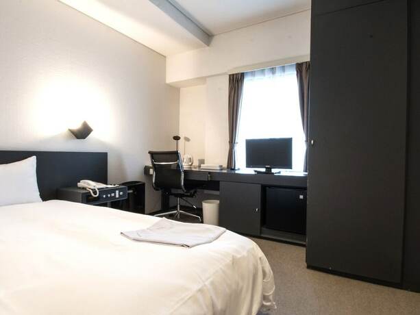 Imagen de la habitación del Hotel The Grand Palace, Tokushima. Foto 27