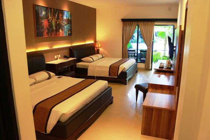 Imagen de la habitación del Hotel The Grand Palace - Yogyakarta. Foto 2