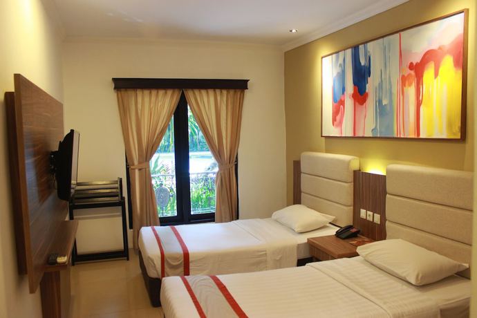 Imagen de la habitación del Hotel The Grand Palace - Yogyakarta. Foto 3