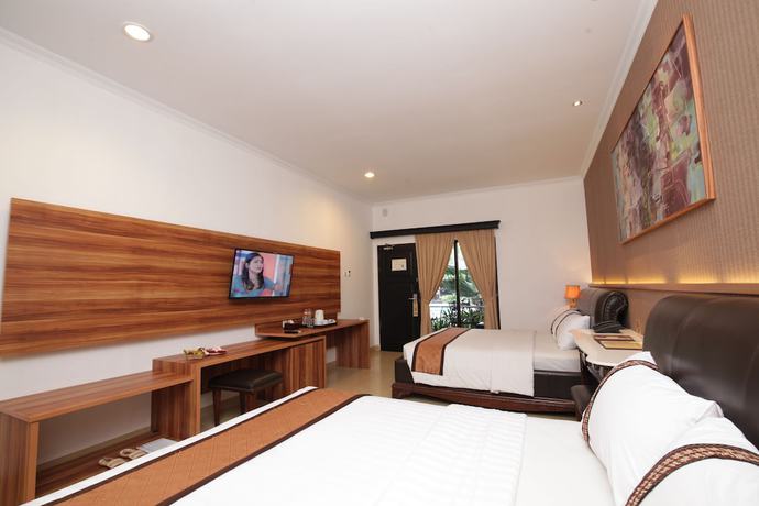 Imagen de la habitación del Hotel The Grand Palace - Yogyakarta. Foto 4