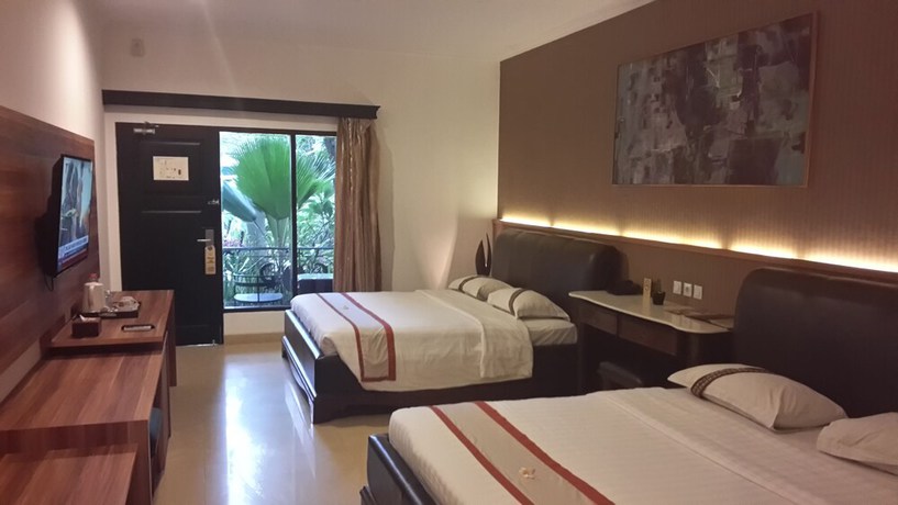 Imagen de la habitación del Hotel The Grand Palace - Yogyakarta. Foto 5