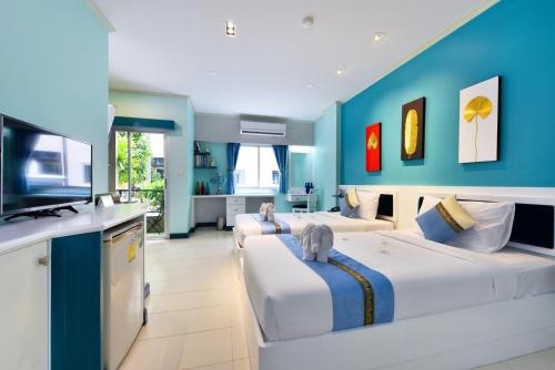 Imagen de la habitación del Hotel The Grand Paradise Suite. Foto 8