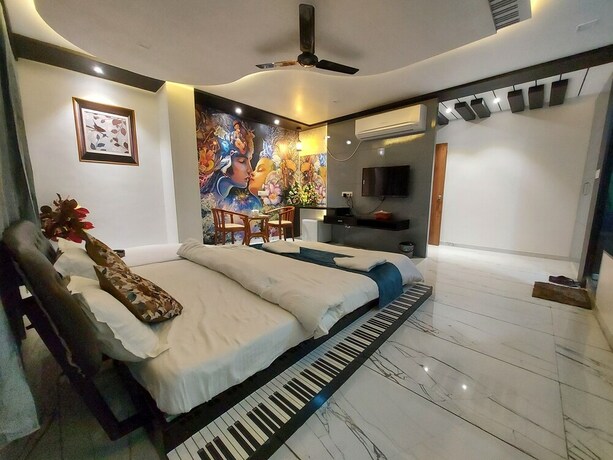 Imagen de la habitación del Hotel The Grand Piano. Foto 22