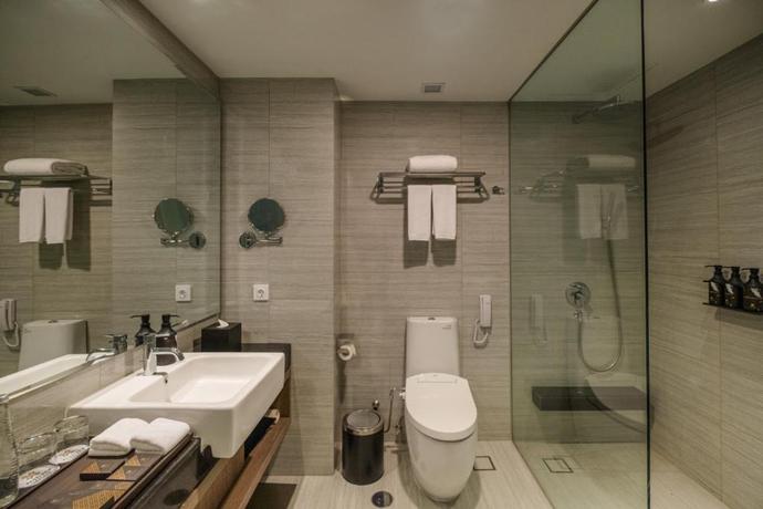 Imagen de la habitación del Hotel The Grand Platinum Jakarta. Foto 15