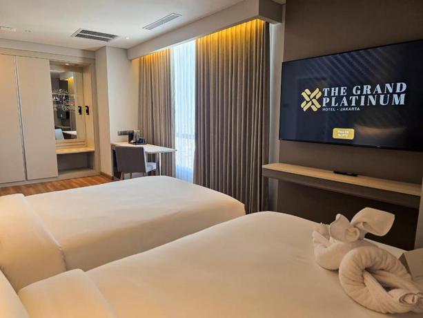 Imagen de la habitación del Hotel The Grand Platinum Jakarta. Foto 18