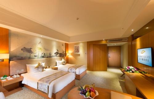 Imagen de la habitación del Hotel The Grand Plaza, Ji'an. Foto 8