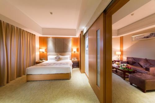Imagen de la habitación del Hotel The Grand Plaza, Ji'an. Foto 11