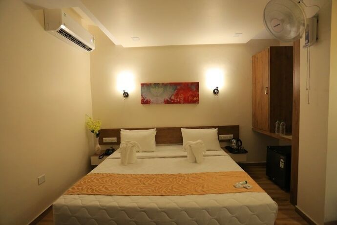 Imagen de la habitación del Hotel The Grand Raveta. Foto 12