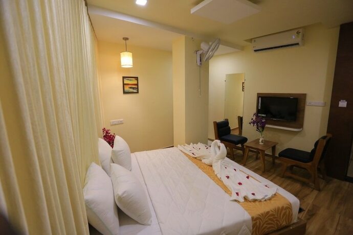 Imagen de la habitación del Hotel The Grand Raveta. Foto 13