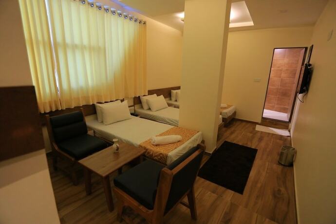 Imagen de la habitación del Hotel The Grand Raveta. Foto 15