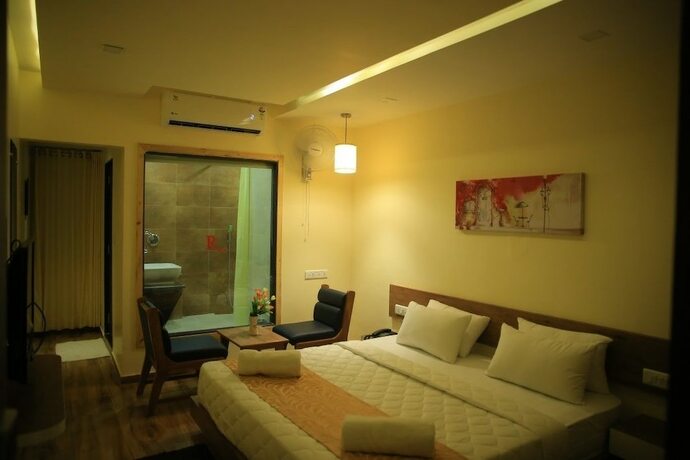 Imagen de la habitación del Hotel The Grand Raveta. Foto 16