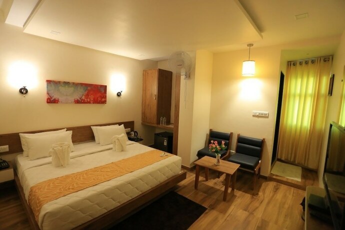 Imagen de la habitación del Hotel The Grand Raveta. Foto 17