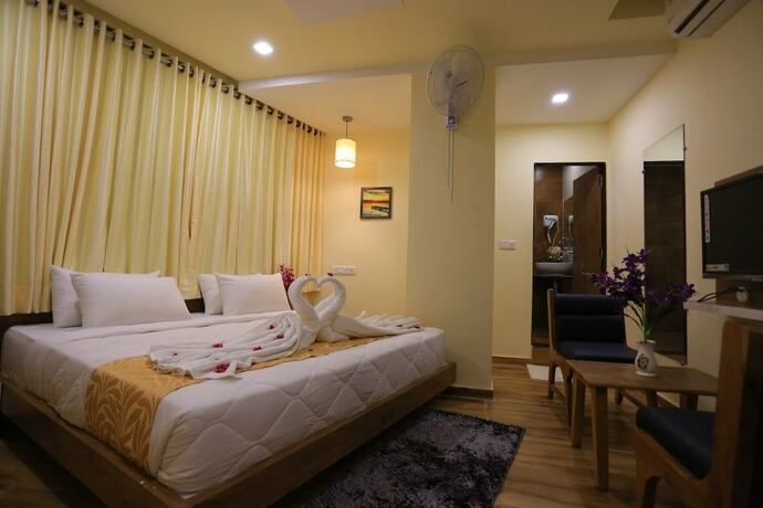 Imagen de la habitación del Hotel The Grand Raveta. Foto 18