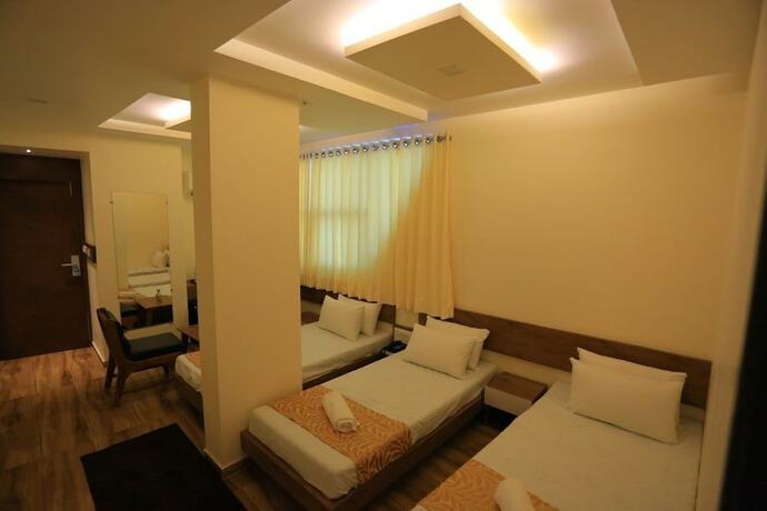 Imagen de la habitación del Hotel The Grand Raveta. Foto 19