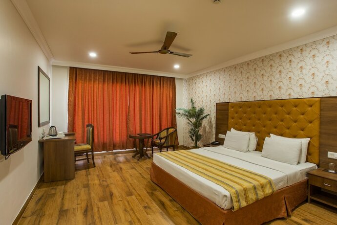 Imagen de la habitación del Hotel The Grand Regency. Foto 11