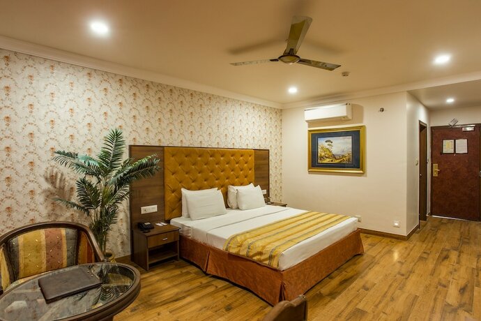 Imagen de la habitación del Hotel The Grand Regency. Foto 18