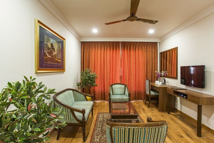 Imagen de la habitación del Hotel The Grand Regency. Foto 20