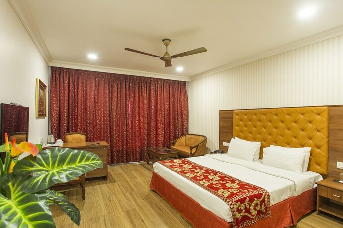 Imagen de la habitación del Hotel The Grand Regency. Foto 21