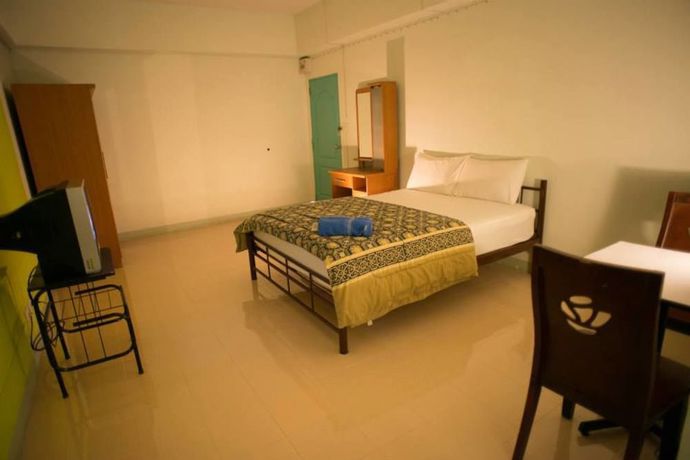 Imagen de la habitación del Hotel The Grand Rewadee. Foto 11