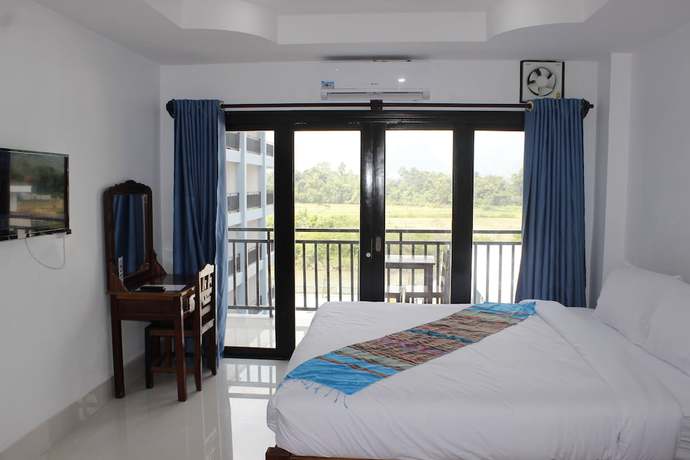 Imagen de la habitación del Hotel The Grand Riverside 2 Vangvieng. Foto 2