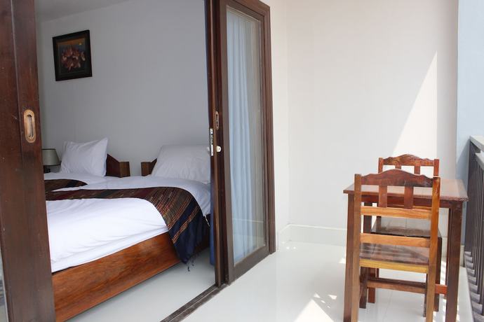 Imagen de la habitación del Hotel The Grand Riverside 2 Vangvieng. Foto 9