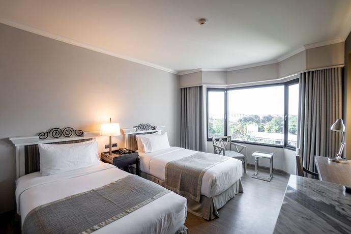 Imagen de la habitación del Hotel The Grand Riverside Phitsanulok. Foto 10