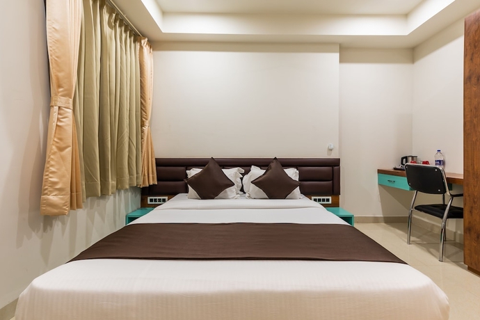 Imagen de la habitación del Hotel The Grand Shaurya. Foto 10