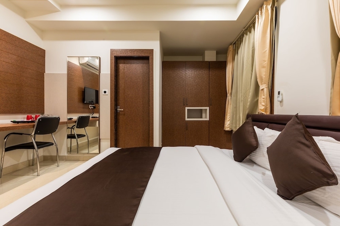 Imagen de la habitación del Hotel The Grand Shaurya. Foto 12