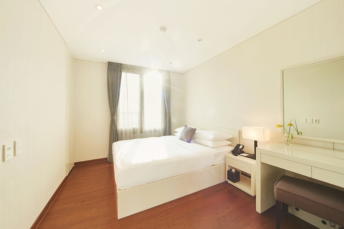 Imagen de la habitación del Hotel The Grand Sumorum. Foto 3