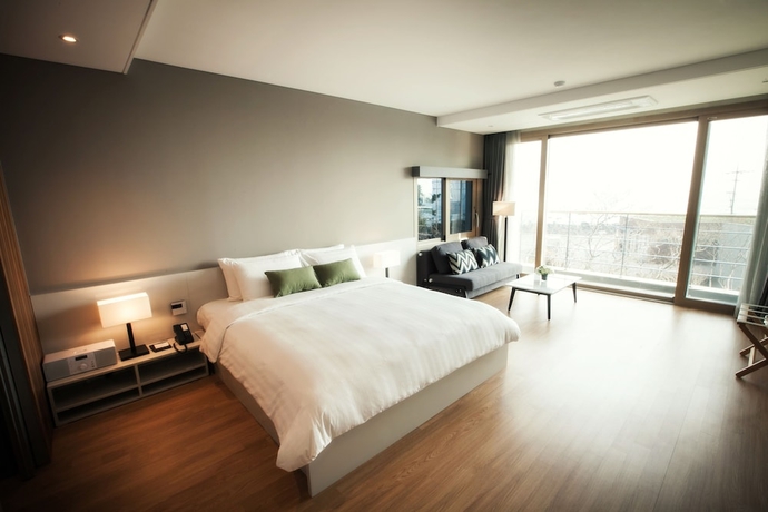 Imagen de la habitación del Hotel The Grand Sumorum. Foto 4