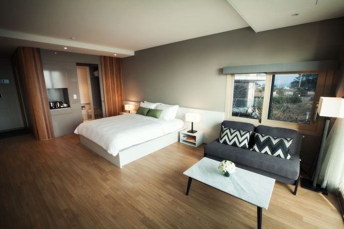 Imagen de la habitación del Hotel The Grand Sumorum. Foto 5