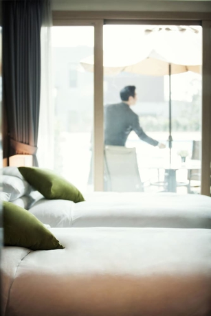 Imagen de la habitación del Hotel The Grand Sumorum. Foto 7