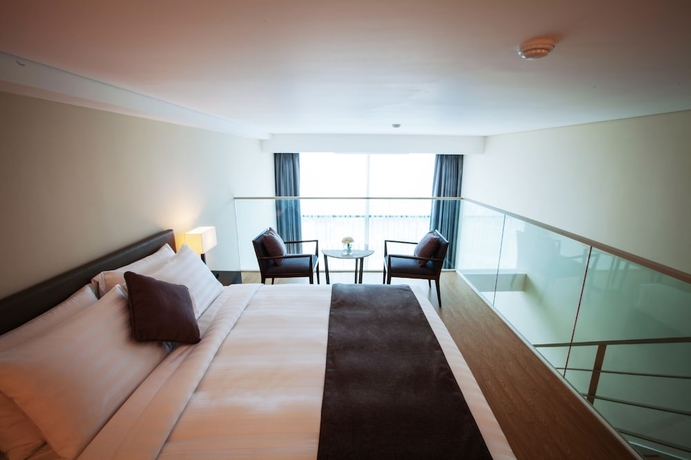 Imagen de la habitación del Hotel The Grand Sumorum. Foto 13