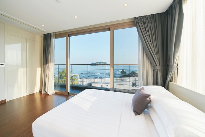 Imagen de la habitación del Hotel The Grand Sumorum. Foto 17