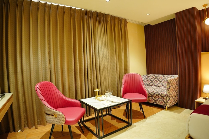 Imagen de la habitación del Hotel The Grand Sun City and Resort. Foto 5