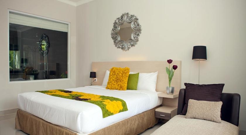 Imagen de la habitación del Hotel The Grand Sunti Resort. Foto 3