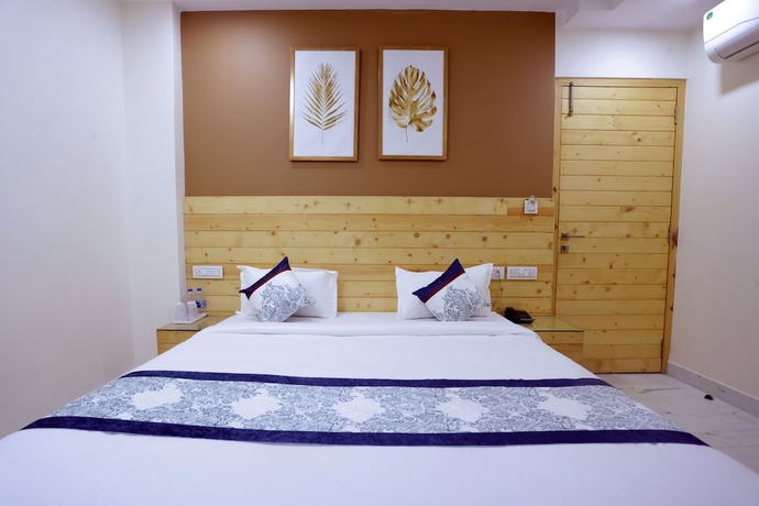 Imagen de la habitación del Hotel The Grand Uddhav. Foto 8
