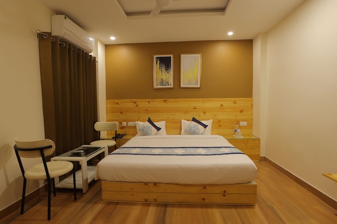 Imagen de la habitación del Hotel The Grand Uddhav. Foto 11