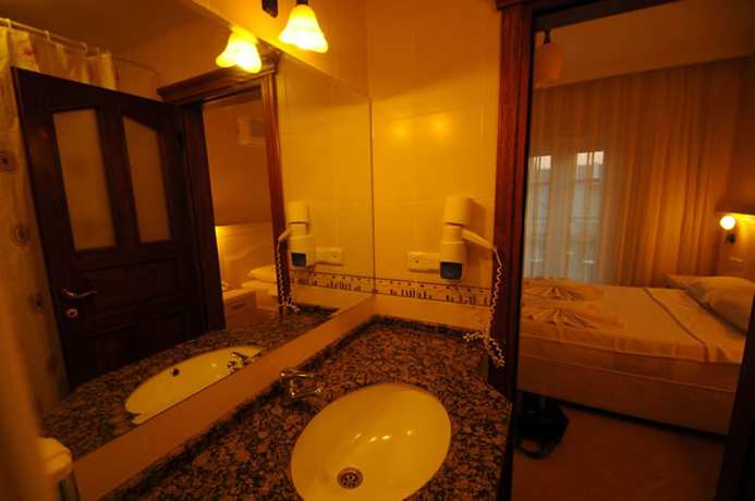 Imagen de la habitación del Hotel The Grand &Uuml;&ccedil;el. Foto 9