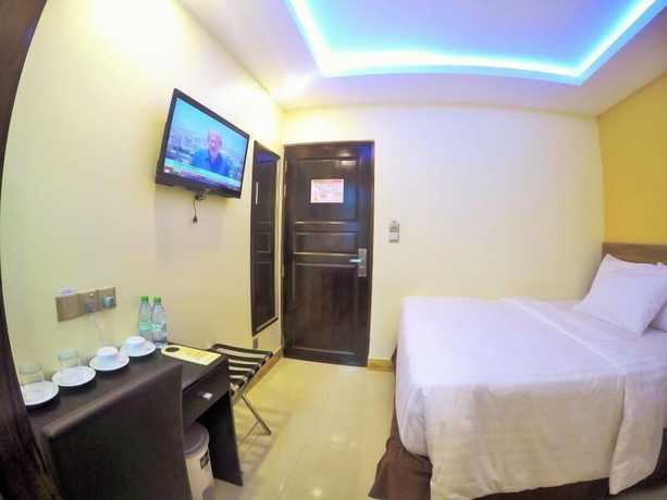 Imagen de la habitación del Hotel The Grand View. Foto 3