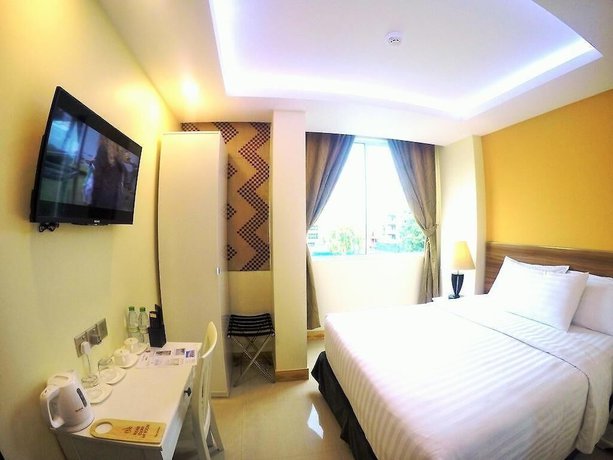 Imagen de la habitación del Hotel The Grand View. Foto 12